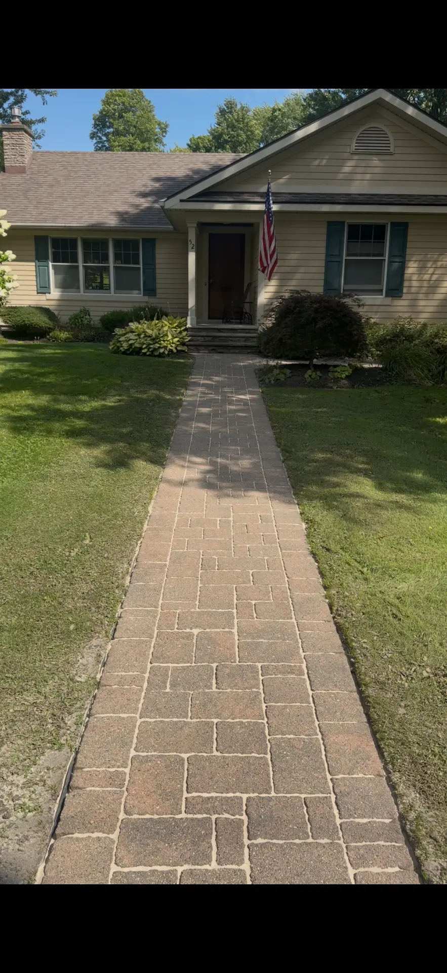Mossy paver walkway cleaned, re-sanded, and restored — after