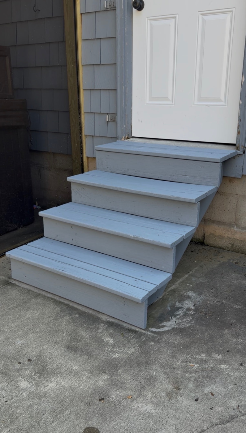 Freshly painted back entry steps after ProWash restoration