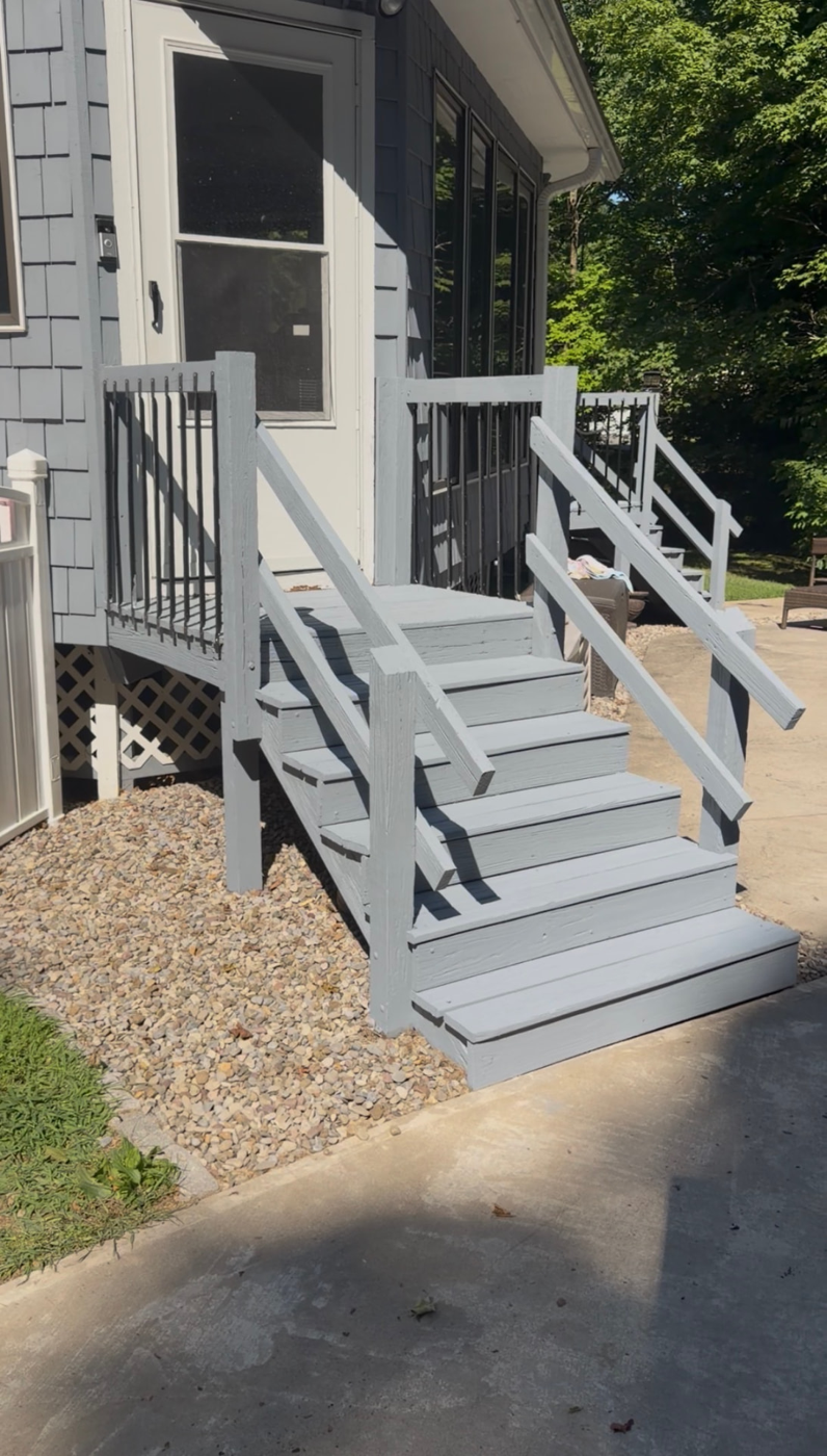 Worn porch steps and railings cleaned and repainted — after
